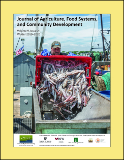 Issue cover of Rhode Island fisherman dumping catch of squid